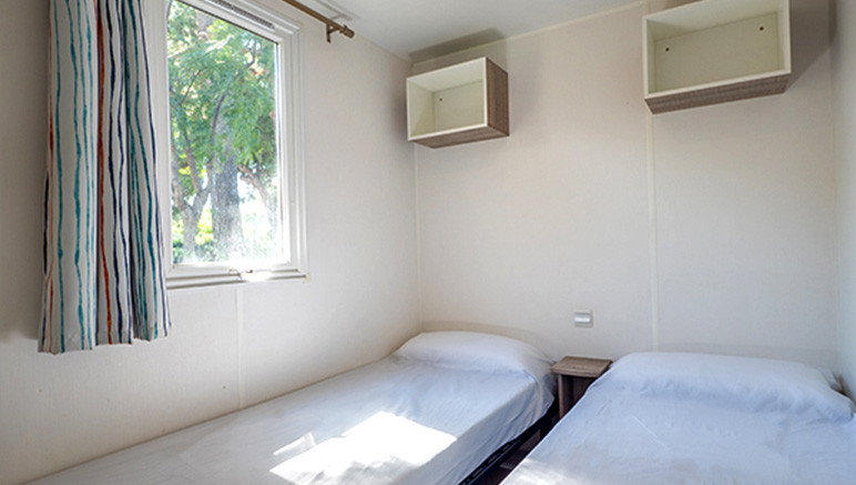 Vente privée Camping 3* Castell d'Aro – La chambre avec deux lits simples